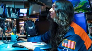 Traders on the floor of the NYSE