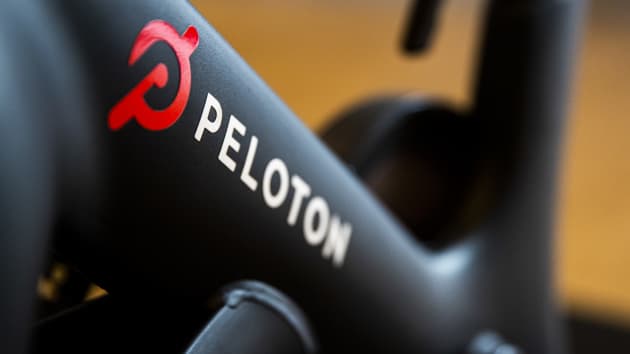 A Peloton Interactive Inc. logo on a stationary bike at the company’s showroom in Dedham, Massachusetts, U.S., on Wednesday, Feb. 3, 2021.