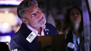 Traders work on the floor of the New York Stock Exchange during afternoon trading on September 13, 2022 in New York City.