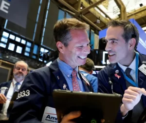 Dow jumps 400 points after rollercoaster week for stocks, earnings season kicks into high gear