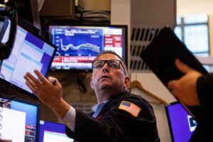 Dow sinks nearly 400 points, yields rise to 2024 highs