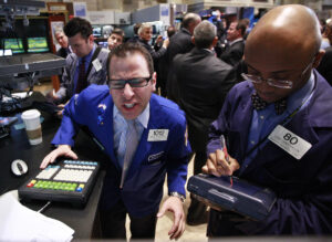 Dow jumps 200 points as earnings roll in
