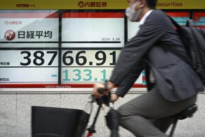 Asian shares are mixed after US holiday quiet