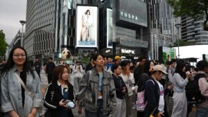 Chinese companies like Alibaba see more consumption, helped by AI ads