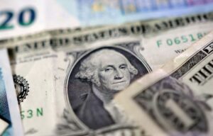 Dollar falls after cooler-than-expected consumer price data