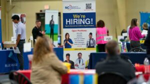 Friday's jobs report likely will show hiring cooled in May. What to expect